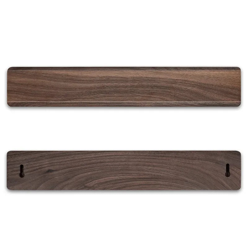 Walnut wooden magnetic knife holder with wall-mount slots, kitchen storage solution.